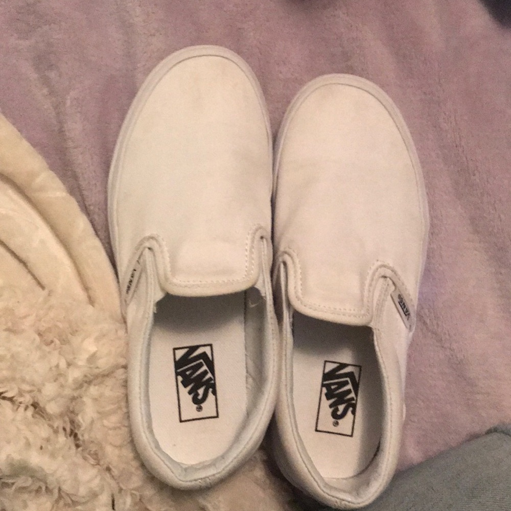 All white slip on vans